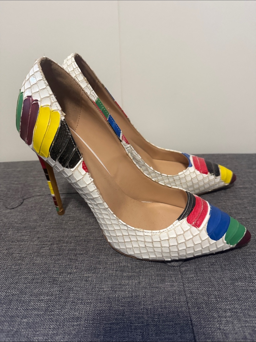 White Textured Pointed Toe Pumps with Rainbow Accent